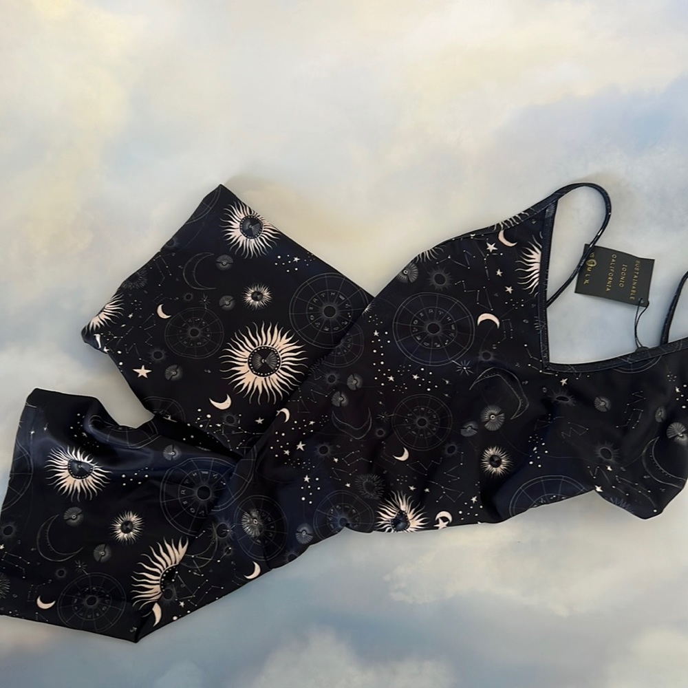 Skatie bodysuit - size small. New. Never worn